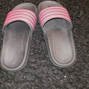 Pink black flip flops size 1